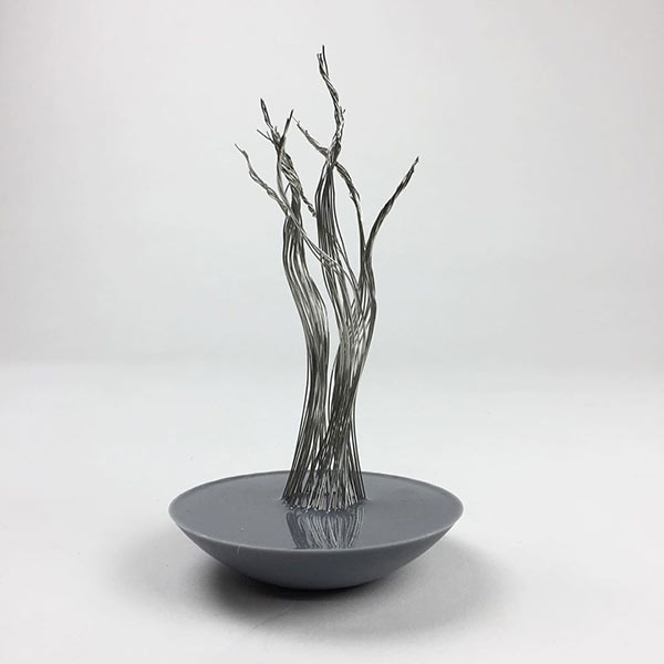Cast resin base for schematic model tree