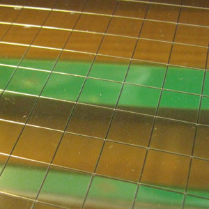 Gold tiled mirrored sheet