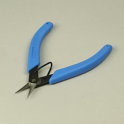 Photo etch scissors for removal of photo-etched parts
