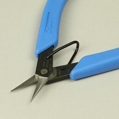 Photo etch scissors for removal of photo-etched parts