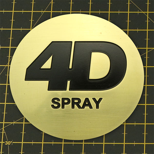 In-filled etching with spray paint